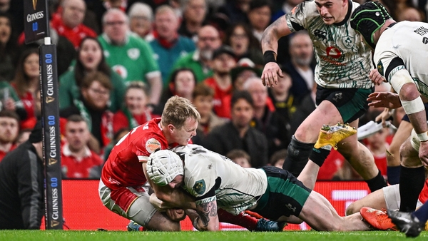 Mack Hansen is held up over the tryline against Wales, one of five times it's happened Ireland in the last four games
