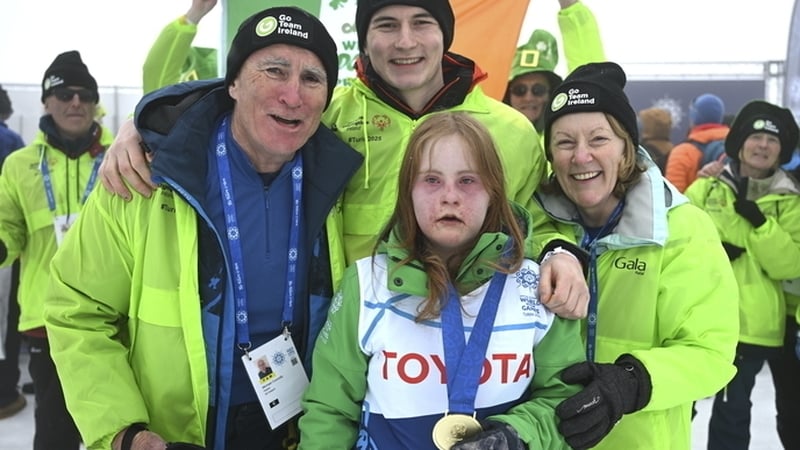 Máire Connolly pictured with her gold medal and her family in Turin
