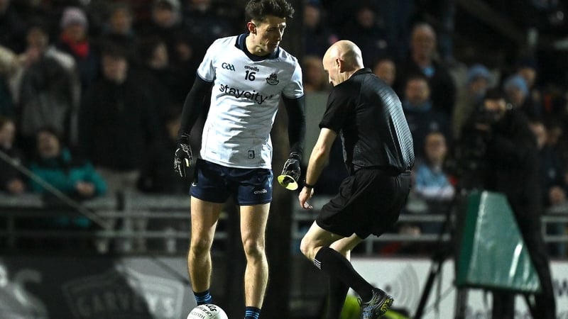 Referee Liam Devenney awarding a free against Dublin goalkeeper Evan Comerford in league game against Kerry on 15 February