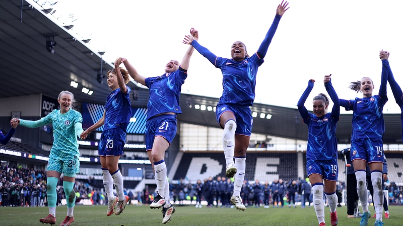 The Chelsea squad celebrate after their League Cup success
