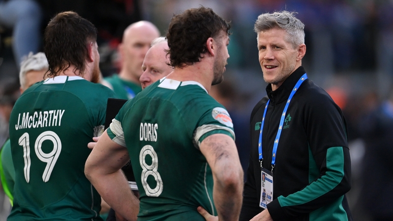 Ireland head coach Simon Easterby speaks to his players after the win against Italy