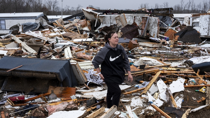 Local news showed roofs torn off homes and large trucks overturned, as forecasters warned of more tornadoes to come this weekend