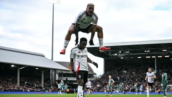 Rodrigo Muniz jumps over Ryan Sessegnon as Fulham celebrated their opening goal