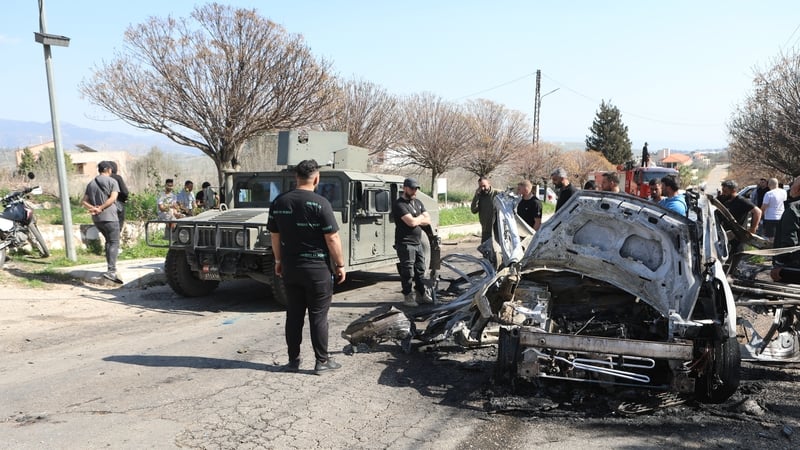 A vehicle targeted by an Israeli airstrike yesterday is seen in the town of Borj El Mlouk in southern Lebanon