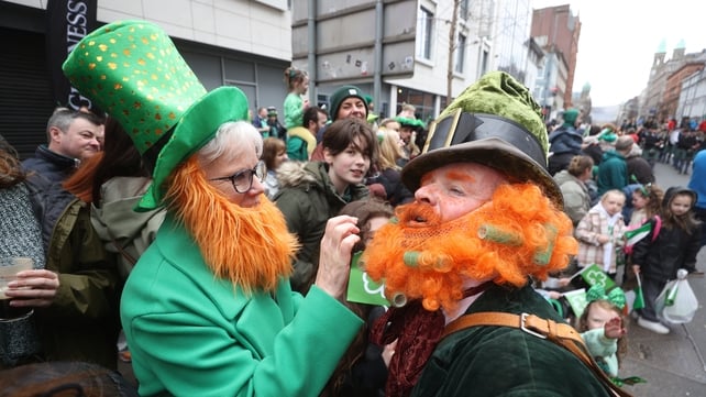Parade-goers in Belfast flaunted some festive facial hair to mark the occasion