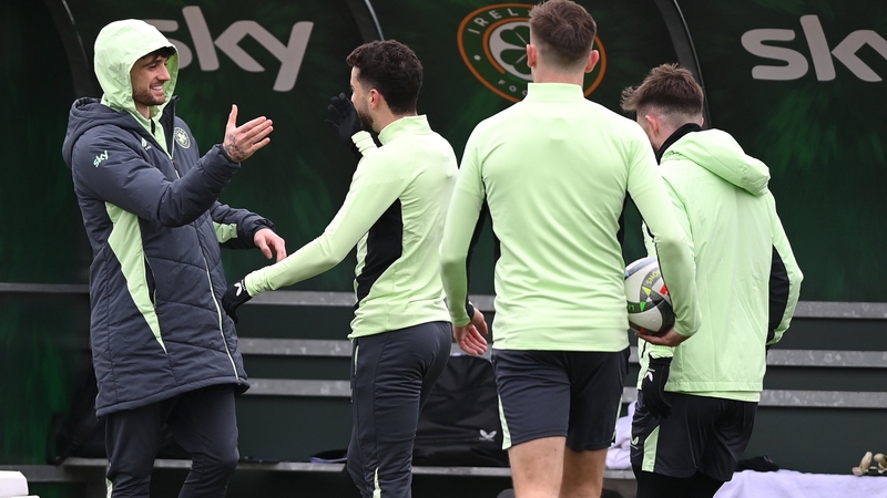 Troy Parrott catching up with Mikey Johnston and other Ireland squad members at training on Monday