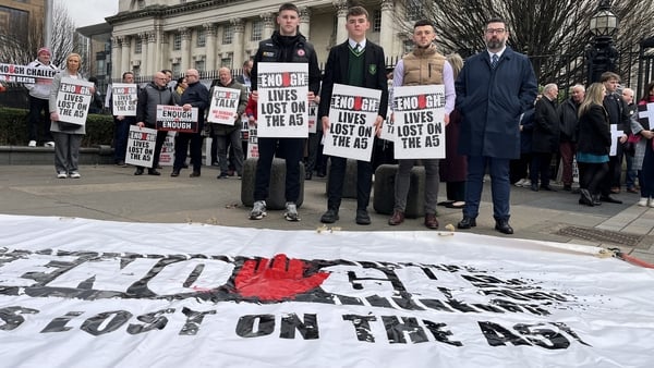The group gathered at the Court of Appeal in Belfast included many who have lost loved ones in the road