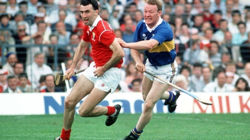Ger Fitzgerald (L) takes on Bobby Ryan of Tipperary in the 1990 Munster SHC final