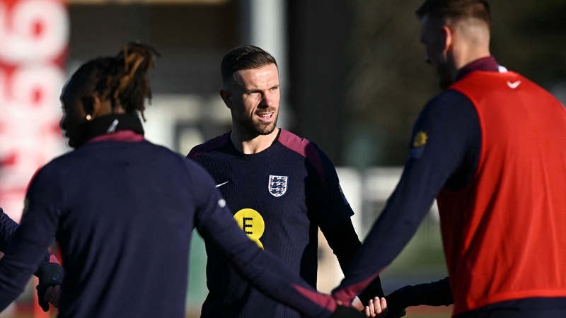 Jordan Henderson (C) at England training today
