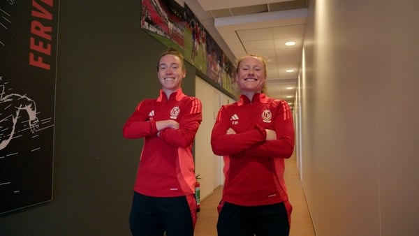 We go to Belgian club Standard Liege to meet Ireland WNT stars Amber Barrett and Claire O'Riordan.