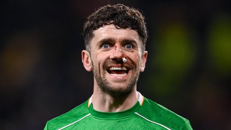 Robbie Brady, battered and bruised, reacts during second half