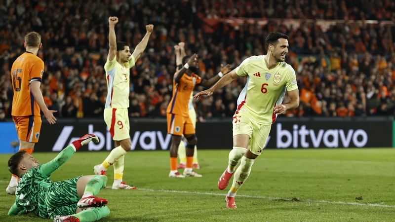 Mikel Merino (R) wheels away in celebration