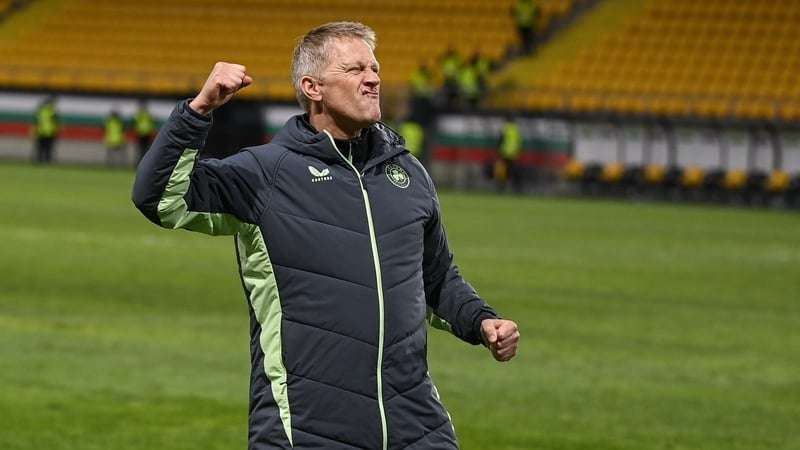 Heimir Hallgrimsson salutes the travelling fans following the victory in Plovdiv