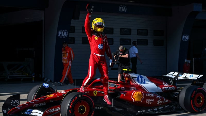Ferrari's Lewis Hamilton celebrates taking pole position after the sprint qualifying session at the Chinese Grand Prix