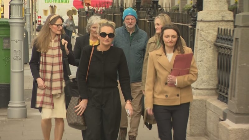 Shane O'Farrell's family arrive for their meeting with Minister Jim O'Callaghan