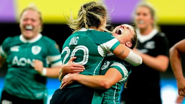 Emily Lane celebrates Ireland's win against New Zealand last year with Erin King