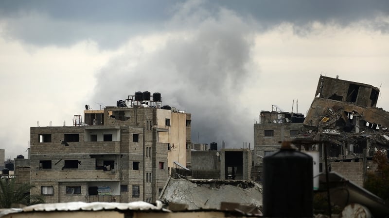 Smoke billows after an Israeli strike near the Bureij refugee camp in central Gaza