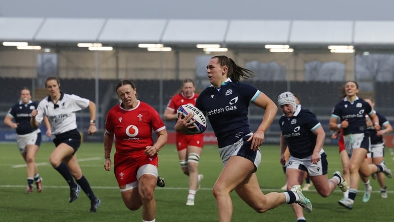 Emma Orr of Scotland on her way to scoring a try