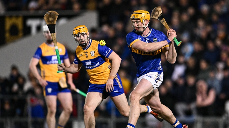 Ronan Maher of Tipperary in action against Robin Mounsey of Clare