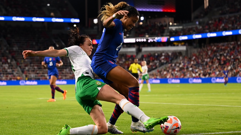 Aine O'Gorman challenges Casey Krueger of the USA during the 2023 friendly in St Louis, Missouri