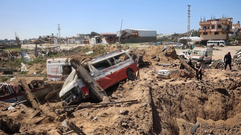 Palestinians inspecting the damage at the al-Maghazi refugee camp in Gaza today
