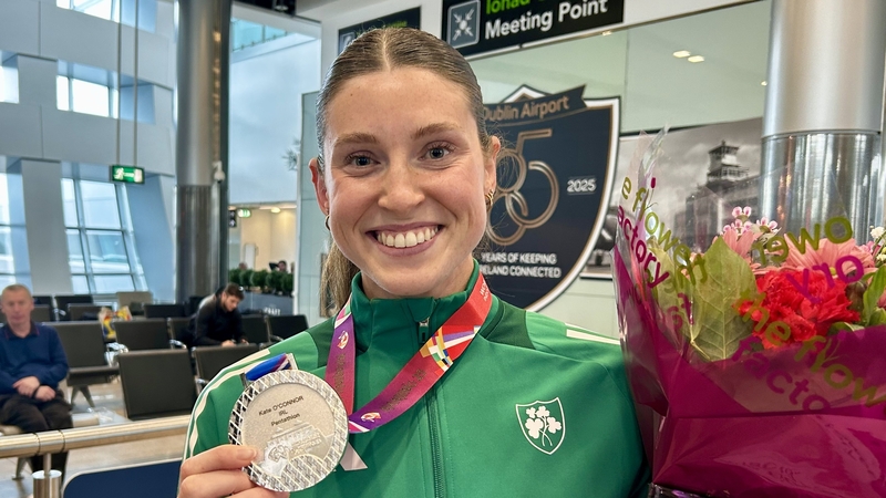 Kate O'Connor arrives home from China with her World Indoor silver medal