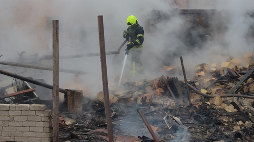 A rescuer works at the site of a Russian missile attack on Ukraine's Black Sea port city of Odesa earlier this month