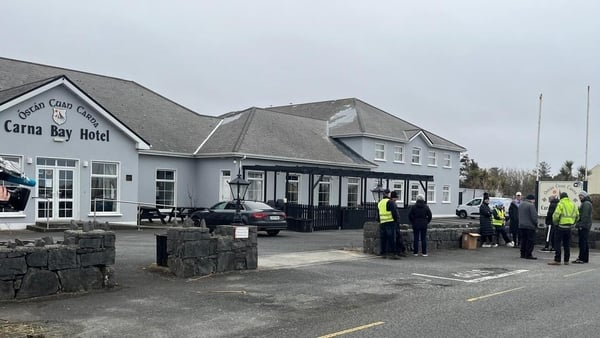 People have gathered outside the Carna Bay Hotel since yesterday evening