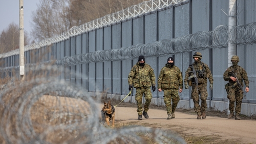 Polish soldiers patrol the border with Belarus