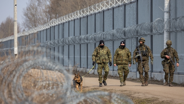 Polish soldiers patrol the border with Belarus