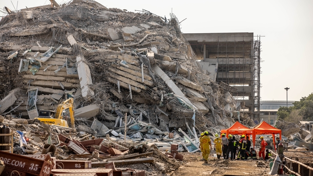 Rescuers at the scene of the building collapse in Bangkok