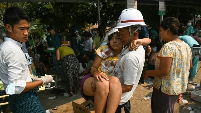 Myanmar Red Cross Society workers transport the injured. Credit: Myanmar Red Cross Facebook Account