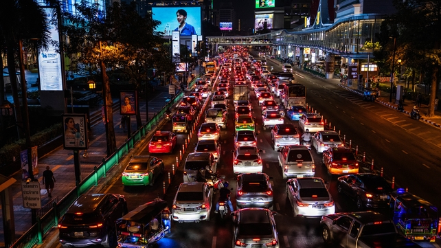Cars wait in traffic in central Bangkok after the city shut down the skytrain