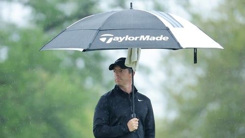 Rory McIlroy birdied his final three holes to get inside the cut-line