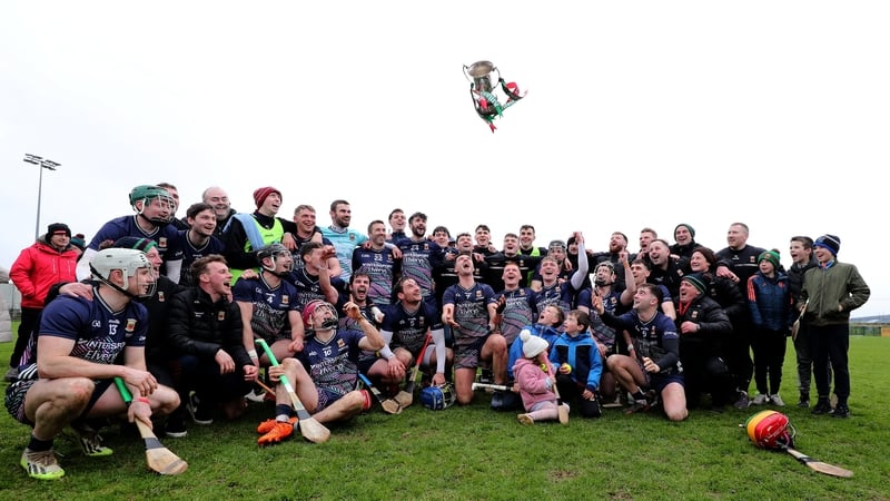 The Mayo team celebrate with the trophy