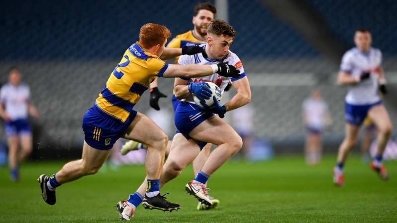 Mícheál Bannigan of Monaghan in action against Colm Neary of Roscommon