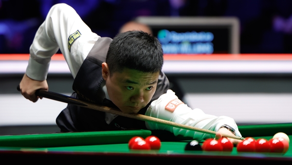 Ding Junhui in action against Mark Williams in Manchester
