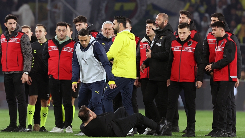 Okan Buruk hits the deck after clashing with Mourinho