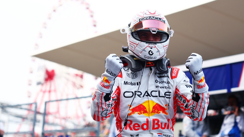 Max Verstappen celebrates after securing pole position at Suzuka