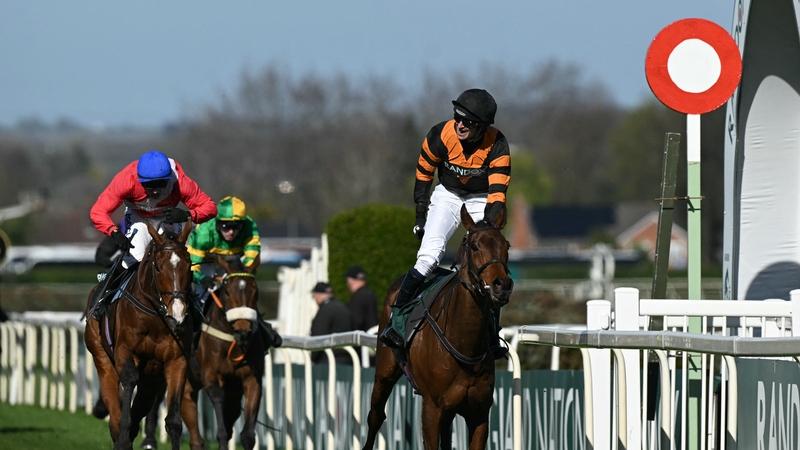Patrick Mullins reacts as he passes the finish line on Nick Rockett