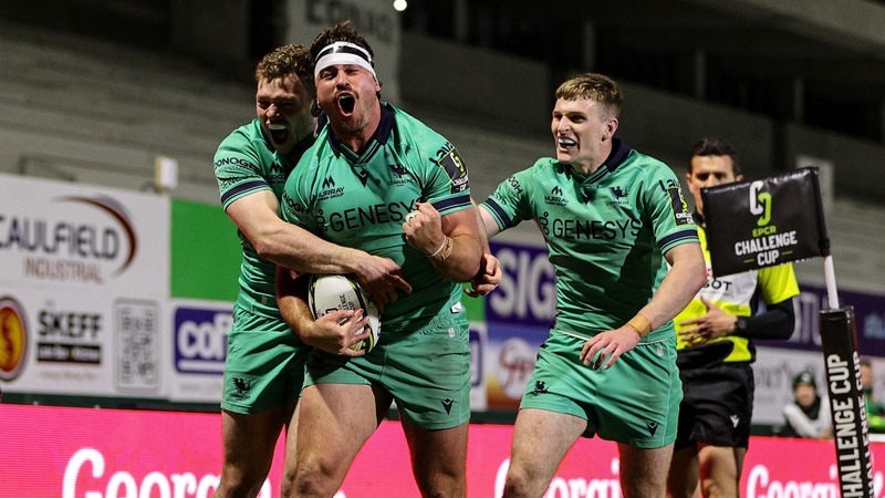 Shayne Bolton celebrates with teammates Cathal Forde and Finn Treacy after scoring a try in Connacht's victory