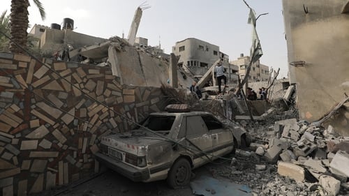 The aftermath of an Israeli airstrike on a house in Deir al-Balah, central Gaza