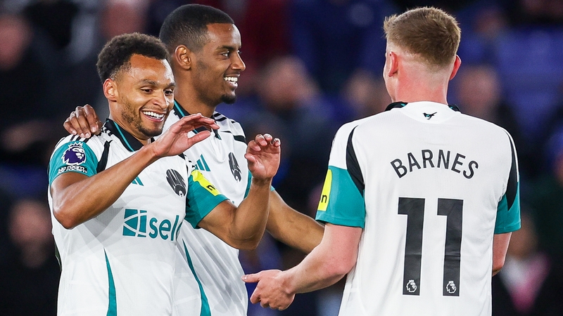 Jacob Murphy celebrates completing his brace with Harvey Barnes, who went on to score Newcastle's third goal of the night