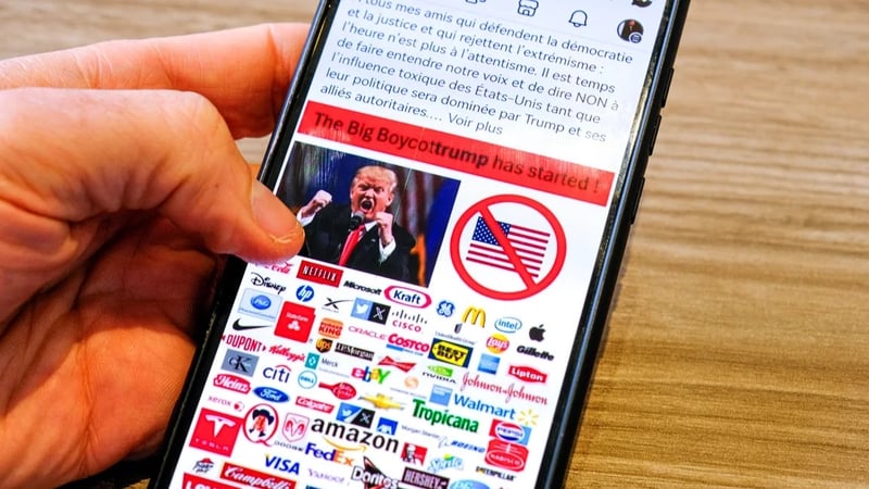 A message broadcast on social media in France calling for a boycott of US goods and businesses in response to Trump's actions. Photo: Nicolas Guyonnet/Hans Lucas via AFP/Getty Images