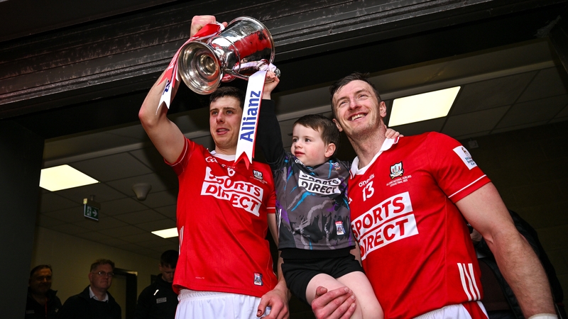 Robert Downey and Patrick Horgan with the league trophy