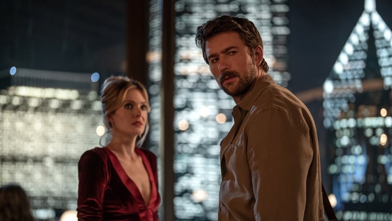 Meghann Fahy as Violet and Brandon Sklenar as Henry in Drop