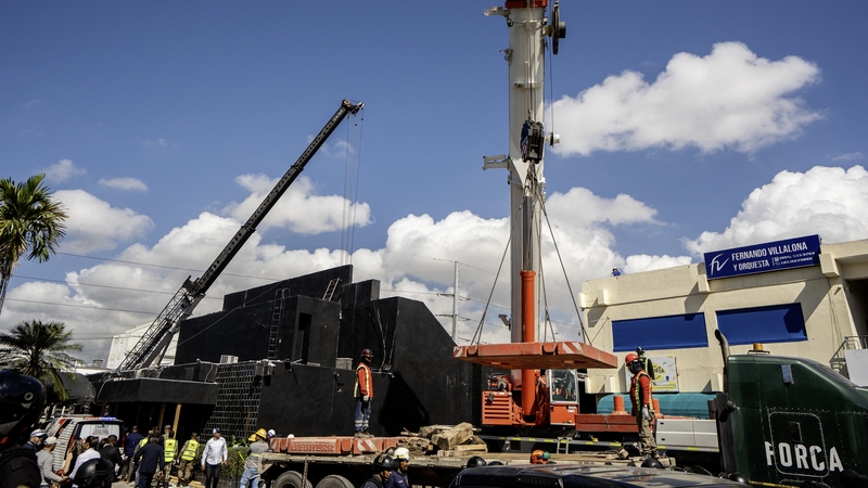 A crane removes debris following the collapse of the Jet Set nightclub roof, in Santo Domingo, Dominican Republic