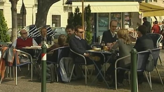 Tourists seated in outdoor dining area (2005)