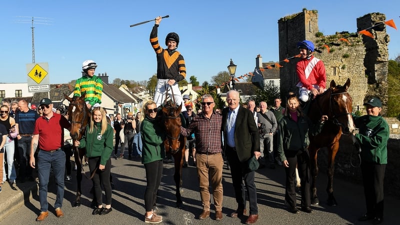 Patrick Mullins rides Nick Rockett through the streets of Leighlinbridge at their Grand National homecoming