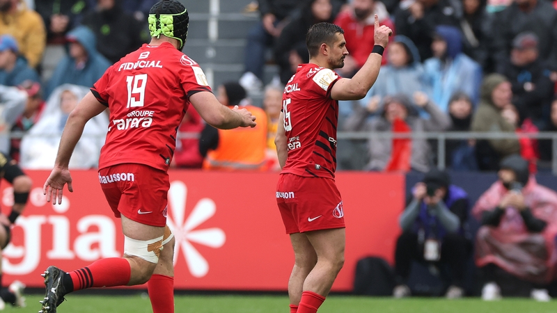 Thomas Ramos (R) celebrates that winning kick